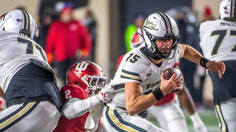 Indiana's Jailin Walker (2) sacks Purdue's Hudson Card (15) during the Indiana versus Purdue football game at Memorial Stadium on Saturday, Nov. 30, 2024. | Rich Janzaruk/Herald-Times / USA TODAY NETWORK via Imagn Images