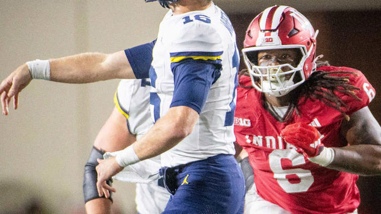 Indiana's Mikail Kamara (6) eyes Michigan's Davis Warren (16) during the Indiana versus Michigan football game at Memorial Stadium on Friday, Nov. 9, 2024. | Rich Janzaruk/Herald-Times / USA TODAY NETWORK via Imagn Images