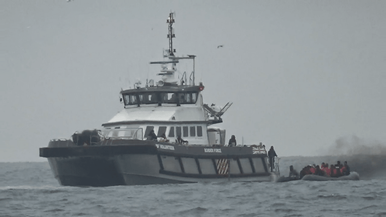 Migrant vessel being rescued by Border Force