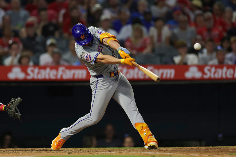 ANAHEIM, CALIFORNIA - AUGUST 3: Pete Alonso #20 of the New York Mets hits a single in the sixth inning during a game against the Los Angeles Angels at Angel Stadium of Anaheim on August 3, 2024 in Anaheim, California.