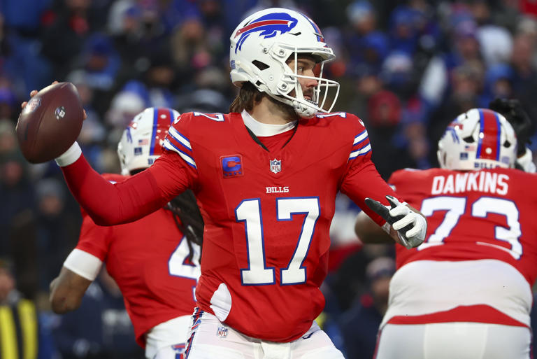 Buffalo Bills quarterback Josh Allen (17) passes against the New England Patriots during the first quarter of an NFL football game, Sunday, Dec. 22, 2024, in Orchard Park, N.Y.. (AP Photo/Jeffrey T. Barnes)