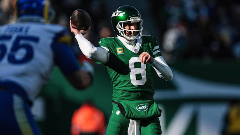 Dec 22, 2024; East Rutherford, New Jersey, USA; New York Jets quarterback Aaron Rodgers (8) throws the ball during the first half against the Los Angeles Rams at MetLife Stadium. | Vincent Carchietta-Imagn Images