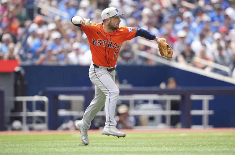 TORONTO, ON - JULY 4: Alex Bregman #2 of the Houston Astros makes a play against the Toronto Blue Jays during the sixth inning in their MLB game at the Rogers Centre on July 4, 2024 in Toronto, Ontario, Canada.