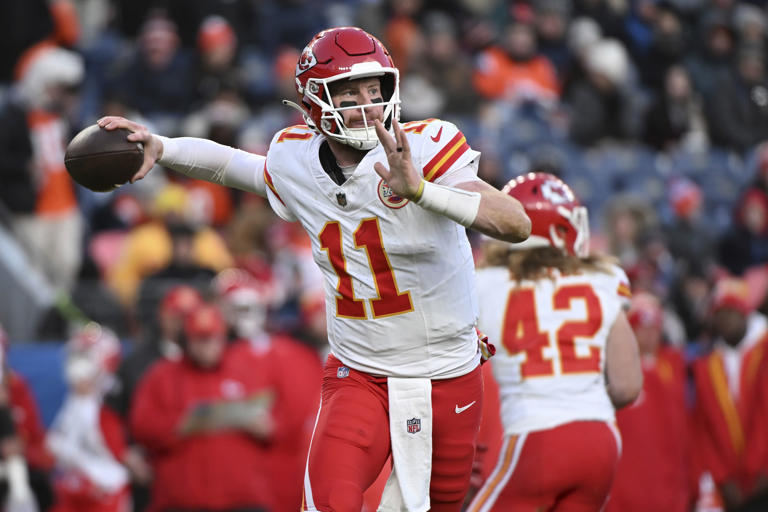 Kansas City Chiefs quarterback Carson Wentz throws during the second half of an NFL football game against the Denver Broncos Sunday, Jan. 5, 2025, in Denver. (AP Photo/Geneva Heffernan)