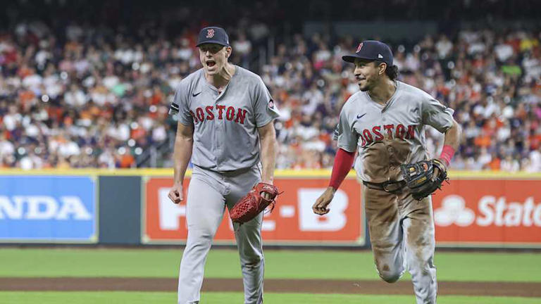 Boston Red Sox starting pitcher Nick Pivetta (37) and second baseman David Hamilton (70) react after a play during the fourth inning against the Houston Astros at Minute Maid Park in 2024. | Troy Taormina-Imagn Images