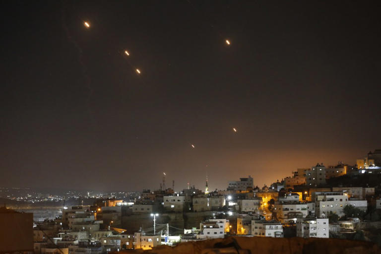 Many rockets, fired from Iran, are seen over Jerusalem from Hebron, West Bank on Oct. 1, 2024. Anadolu via Getty Images