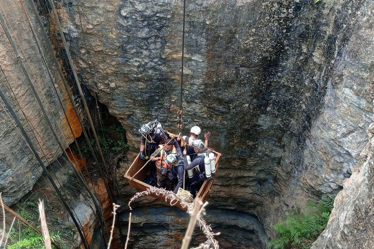 Divers use a pulley to enter a coal mine to rescue trapped miners in Umrangso, a remote area in the northeastern state of Assam, India, January 7, 2025. REUTERS/Stringer