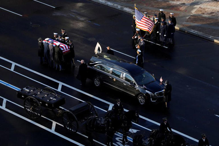 Former US President Jimmy Carter's body arrives in Washington for honors