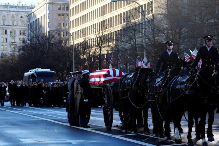 Former US President Jimmy Carter's body arrives in Washington for honors