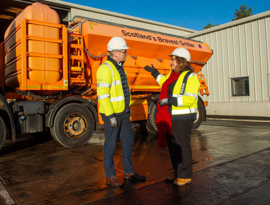 Scotland’s Transport Secretary Fiona Hyslop visited the Burghmuir gritter depot in West Lothian to see “Scotland’s Bravest Gritter," a vehicle named by Scotland’s Bravest Manufacturing Company.