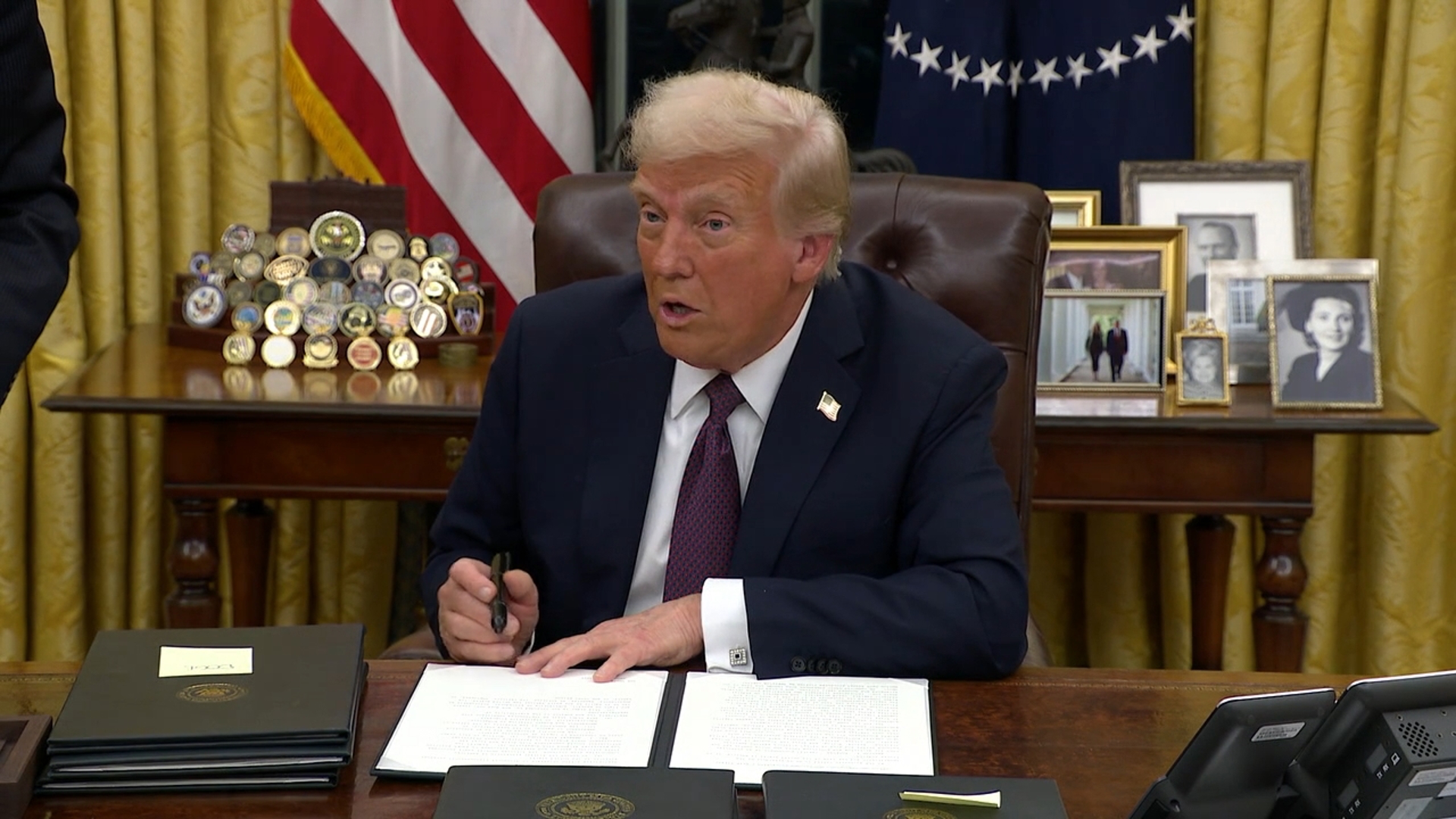 Trump signs several executive orders inside the Oval Office on Day 1