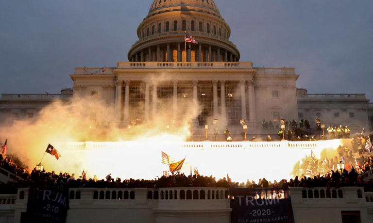 Supporters of Donald Trump riot in front of the US Capitol in Washington on 6 January 2021. Photograph: Leah Millis/Reuters