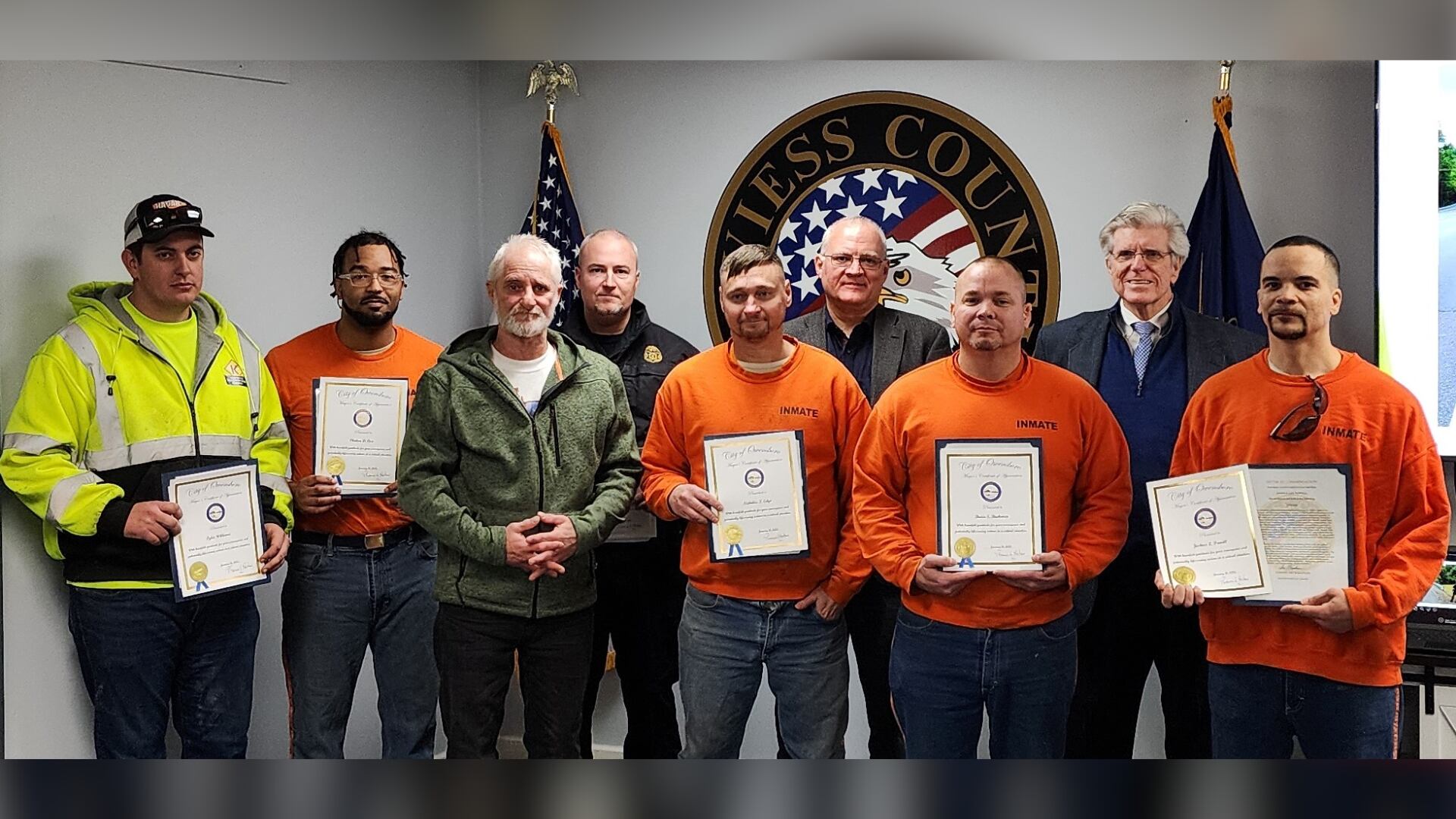Inmates, deputy recognized for saving semi driver from crash