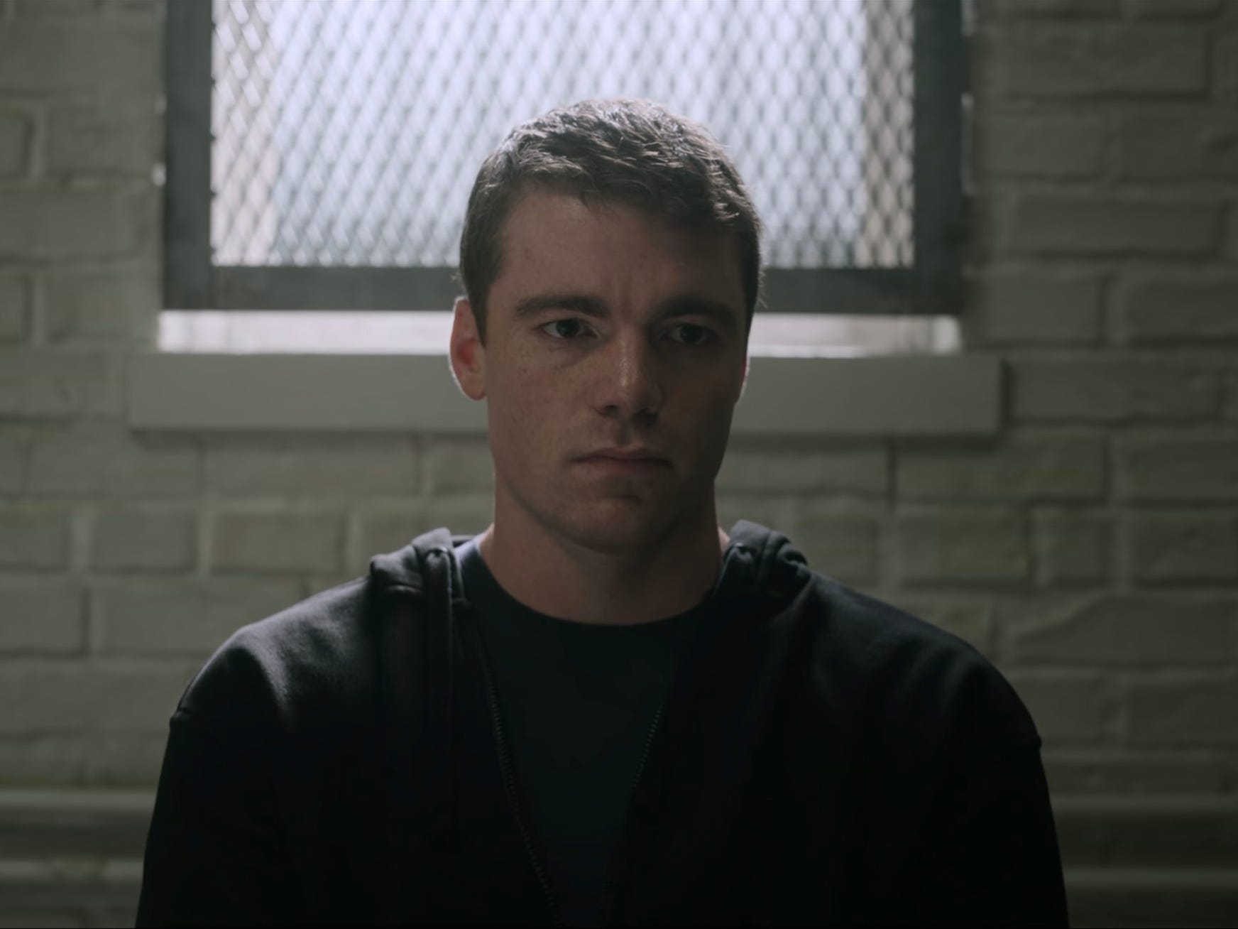 Basso as Peter Sutherland in season two, episode 10 of "The Night Agent." Netflix