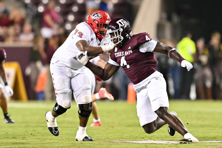 Sep 2, 2023; College Station, Texas, USA; Texas A&M Aggies defensive lineman Shemar Stewart (4) breaks past New Mexico Lobos offensive lineman Matthew Toilolo (74) during the fourth quarter at Kyle Field. Mandatory Credit: Maria Lysaker-USA TODAY Sports