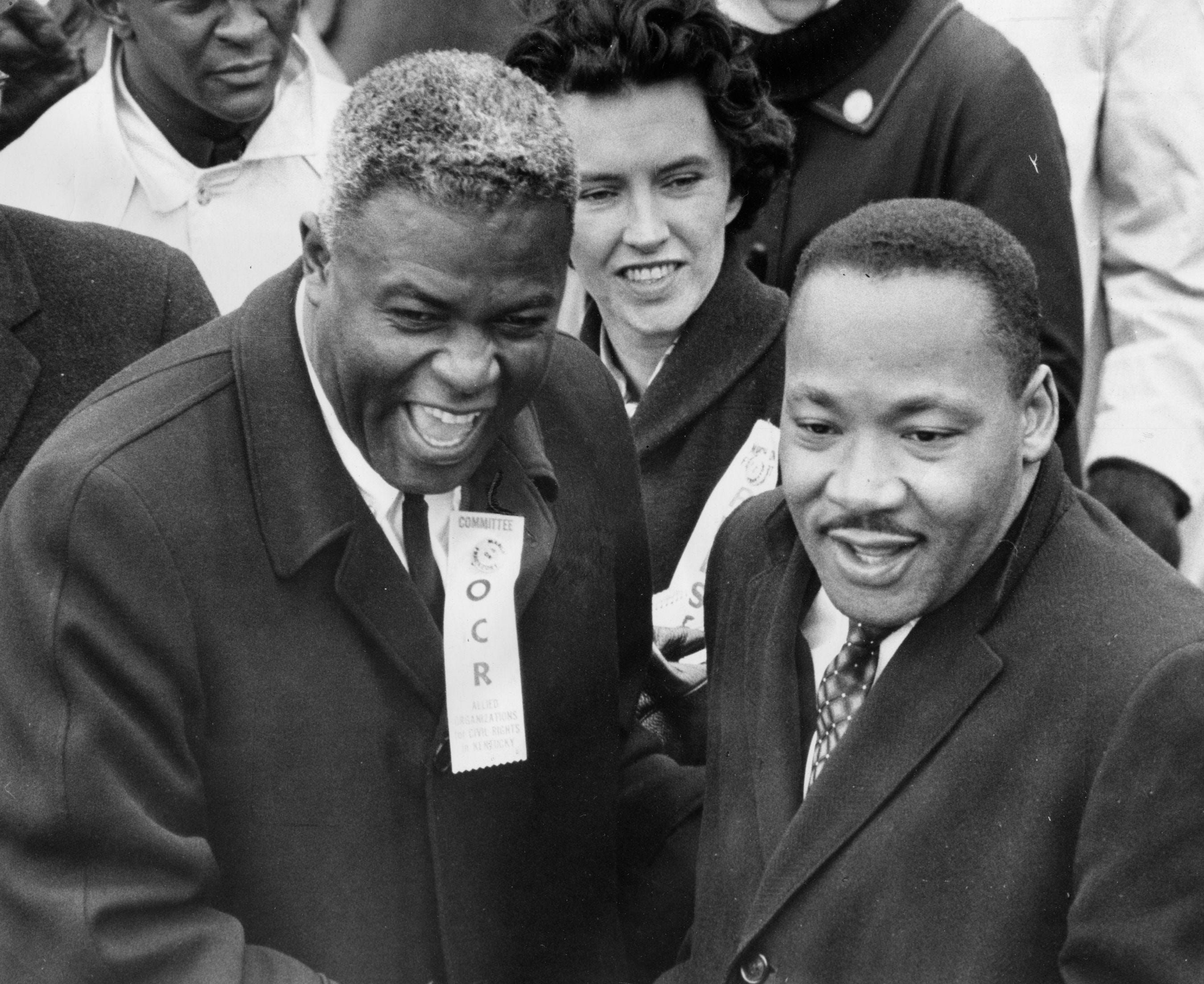 Mar 5, 1964; Louisville, KY, USA; Jackie Robinson wore an Organization for Civil Rights badge when he took part in a Louisville march with Dr. Martin Luther King in 1964.