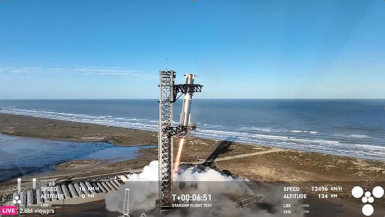 In this screen grab taken from the SpaceX broadcast the Starship's Super Heavy Booster is being grabbed as it returns to the launch pad at Starbase near Boca Chica, Texas, on Jan. 16, 2025.