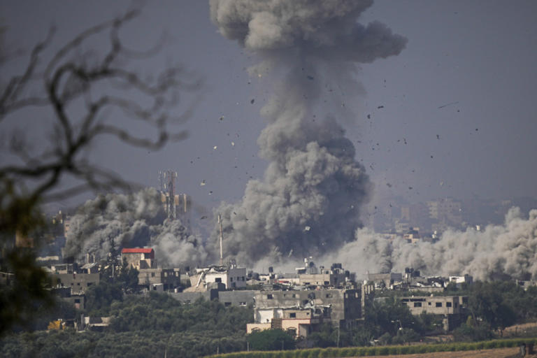 Smoke rises following an Israeli airstrike in the Gaza Strip on October 23, 2023 (AP)