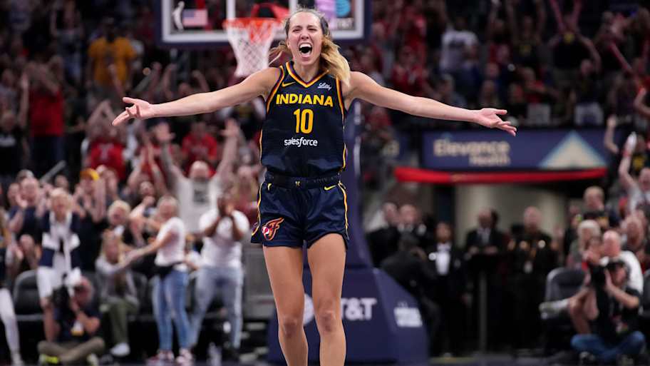 Indiana Fever guard Lexie Hull (10) celebrates after scoring a three-point field goal during the second half of a game against the Seattle Storm on Sunday, Aug. 18, 2024, at Gainbridge Fieldhouse in Indianapolis. The Fever defeated the Storm 92-75. | Christine Tannous/IndyStar / USA TODAY NETWORK via Imagn Images