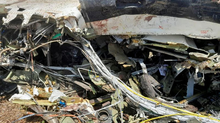 The wreckage of a plane that crashed, killing people as it was heading to the capital Juba, at the Unity oilfield airport, Unity State, South Sudan, January 29, 2025. REUTERS/Stringer