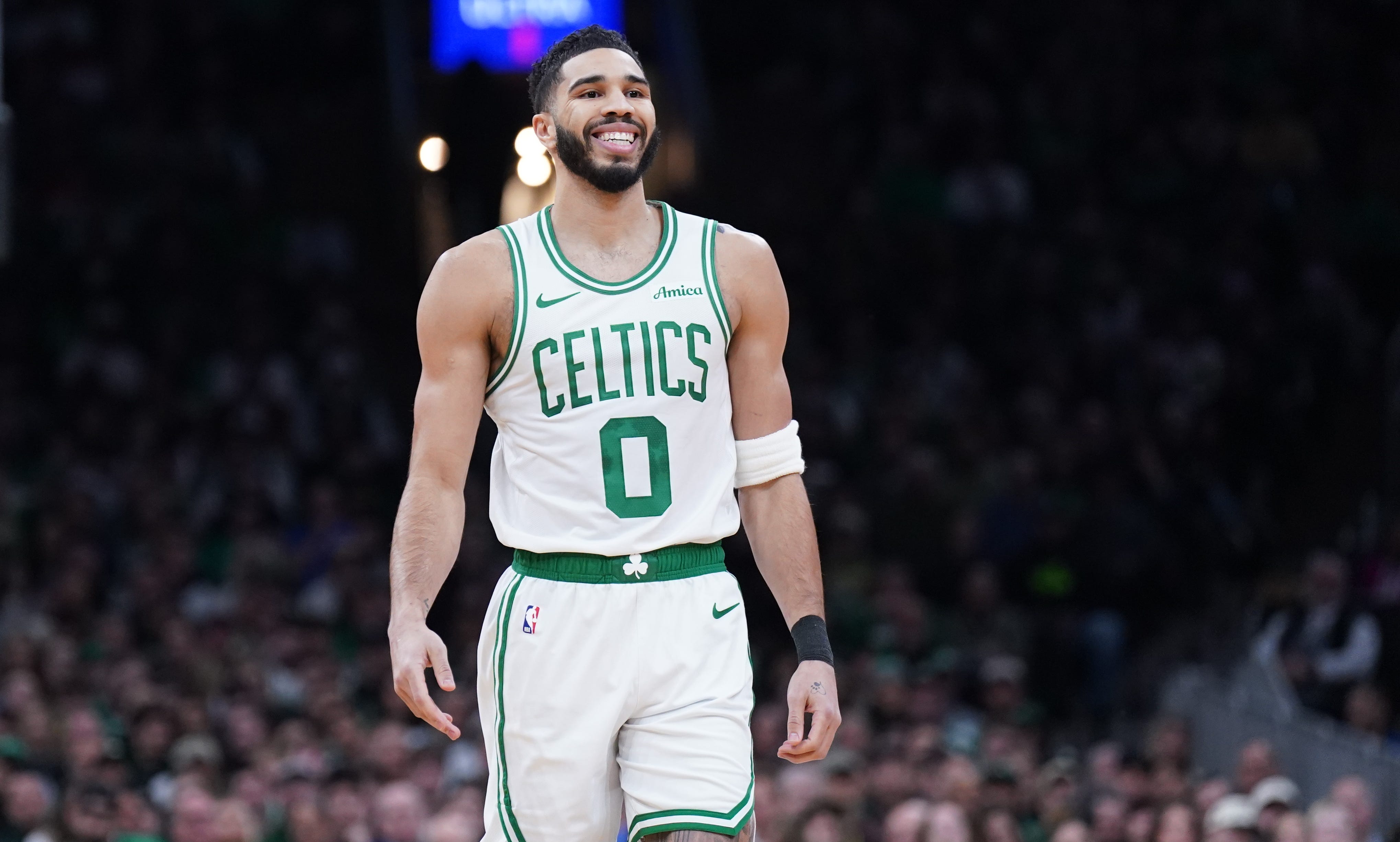 Jan 27, 2025; Boston, Massachusetts, USA; Boston Celtics forward Jayson Tatum (0) reacts after missing a three point try against the Houston Rockets in the second quarter at TD Garden. Mandatory Credit: David Butler II-Imagn Images