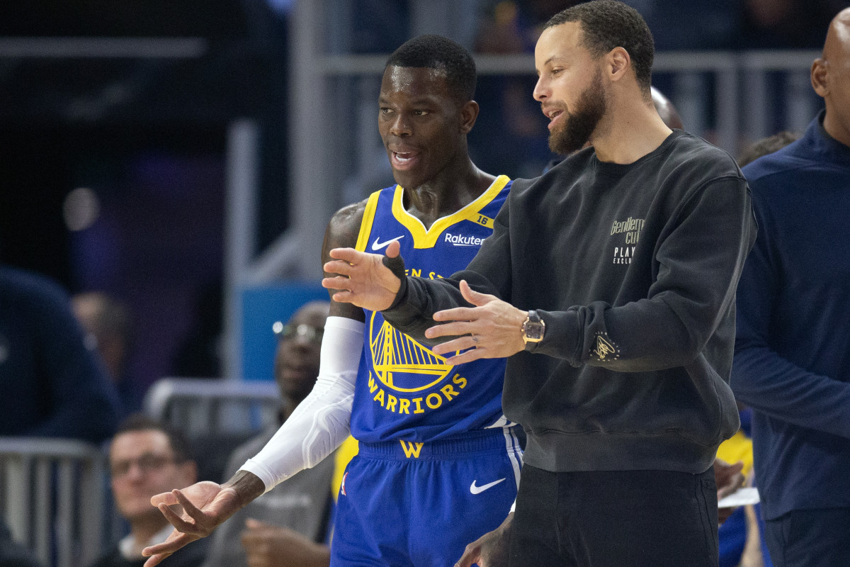 Jan 28, 2025; San Francisco, California, USA; Golden State Warriors guard Dennis Schröder (71) confers with Stephen Curry during the first quarter against the Utah Jazz at Chase Center. © D. Ross Cameron-Imagn Images
