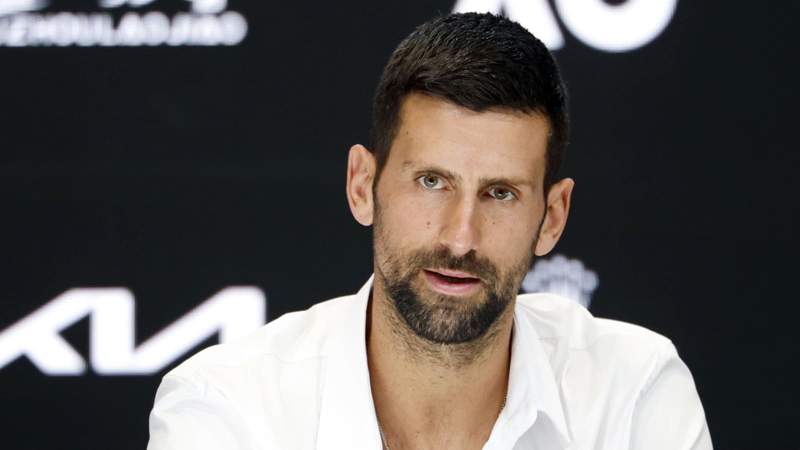 Novak Djokovic apologises after avoiding Australian Open disqualification and gives injury update<br><br>