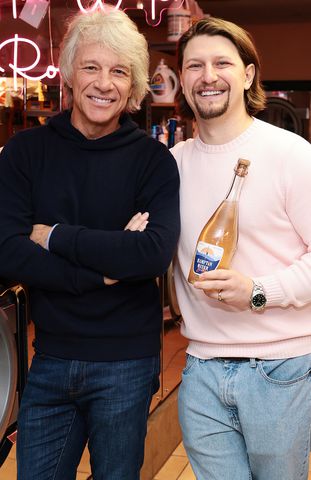 Dimitrios Kambouris/Getty Images for Hampton Water Jon Bon Jovi and Jesse Bongiovi attend Hampton Water celebrates Bubbly with Jon Bon Jovi at La La Laundry on January 30, 2025 in New York City.