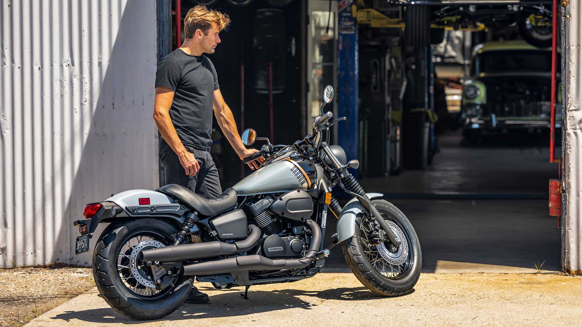 Guy standing next to a 2024 Honda Shadow Phantom