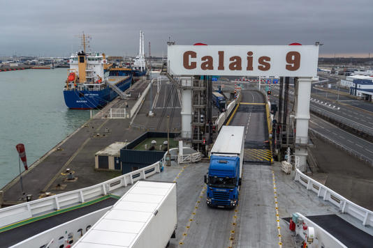 A truck boards a cross-channel ferry on 21 January last year in Calais, France (Getty Images)