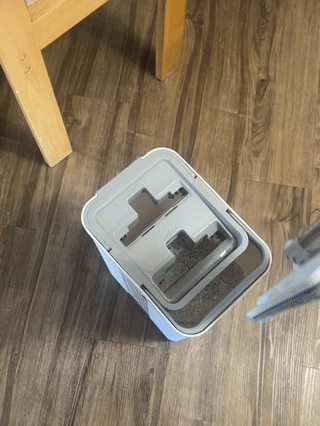 flat mop goes into bucket