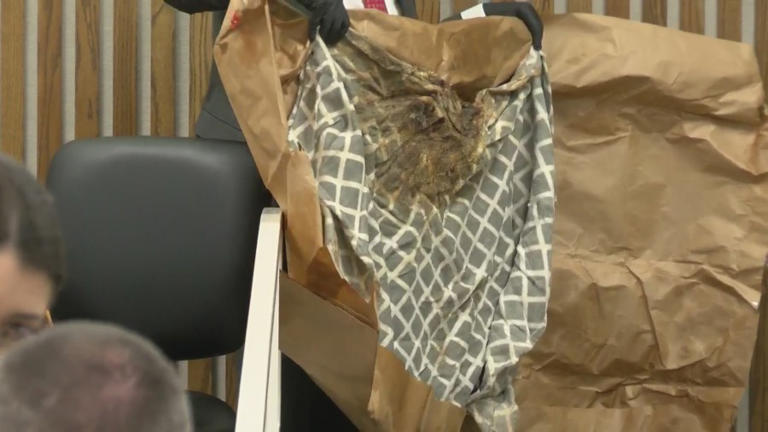 LIVE: Trash can Evelyn Boswell was found in shown to jury