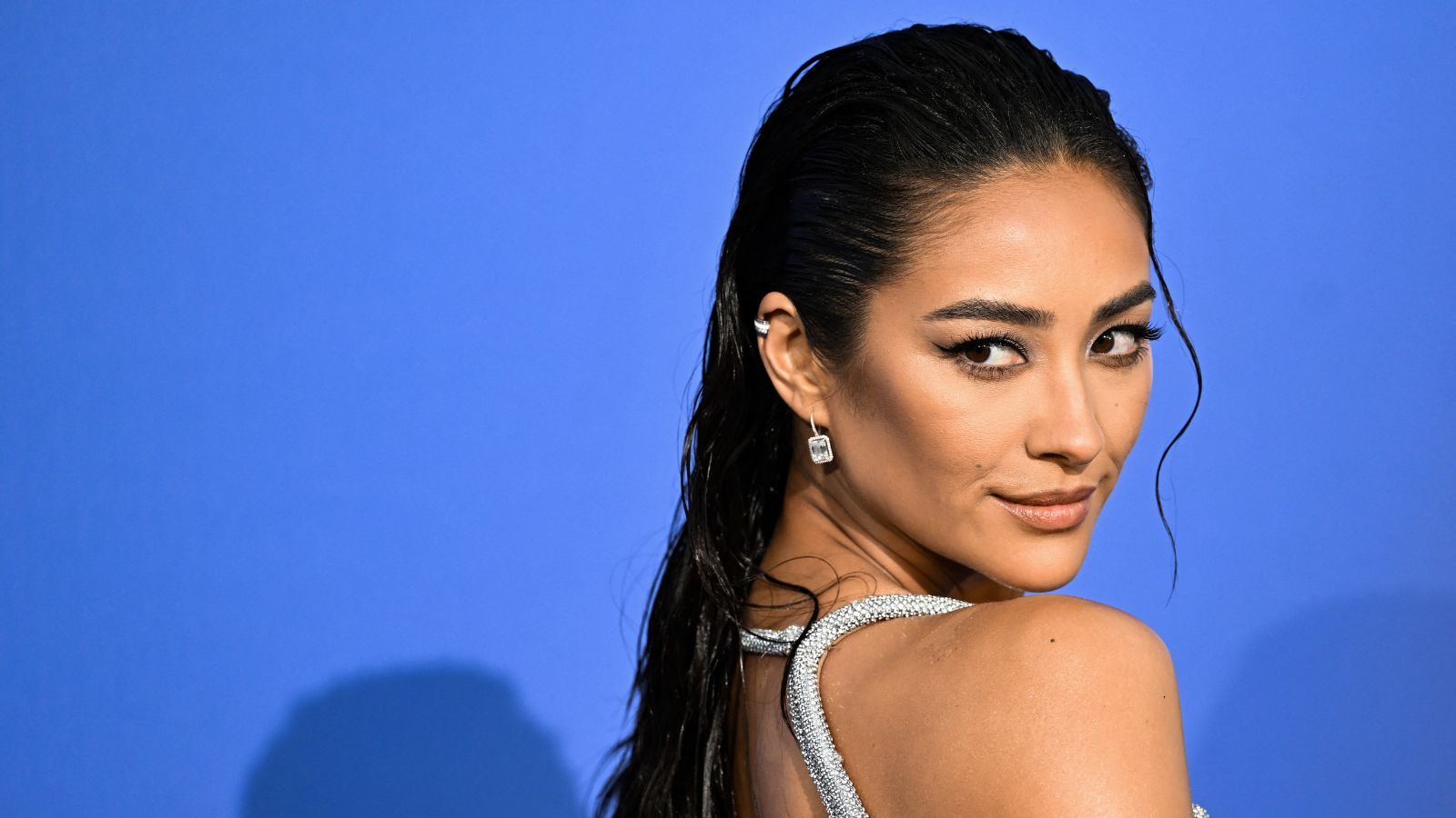Shay Mitchell carries this candle in her travel bag because the scent