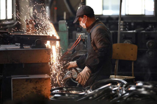 Tarifas de Trump também visam a China, que responde por mais da metade da produção global de aço Foto: AFP