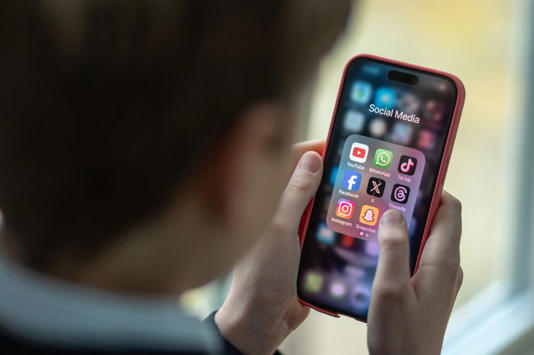 Young boy using a smartphone