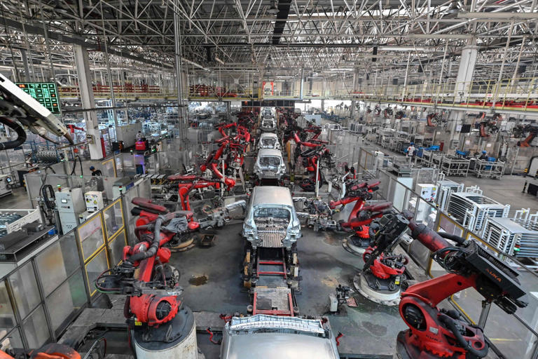 An electric-vehicle production line at a Leapmotor factory in Jinhua, Zhejiang province, on September 18, 2024. The US and Canada in recent years have aligned on foreign policy such as imposing tariffs on Chinese-made EVs. Photo: AFP