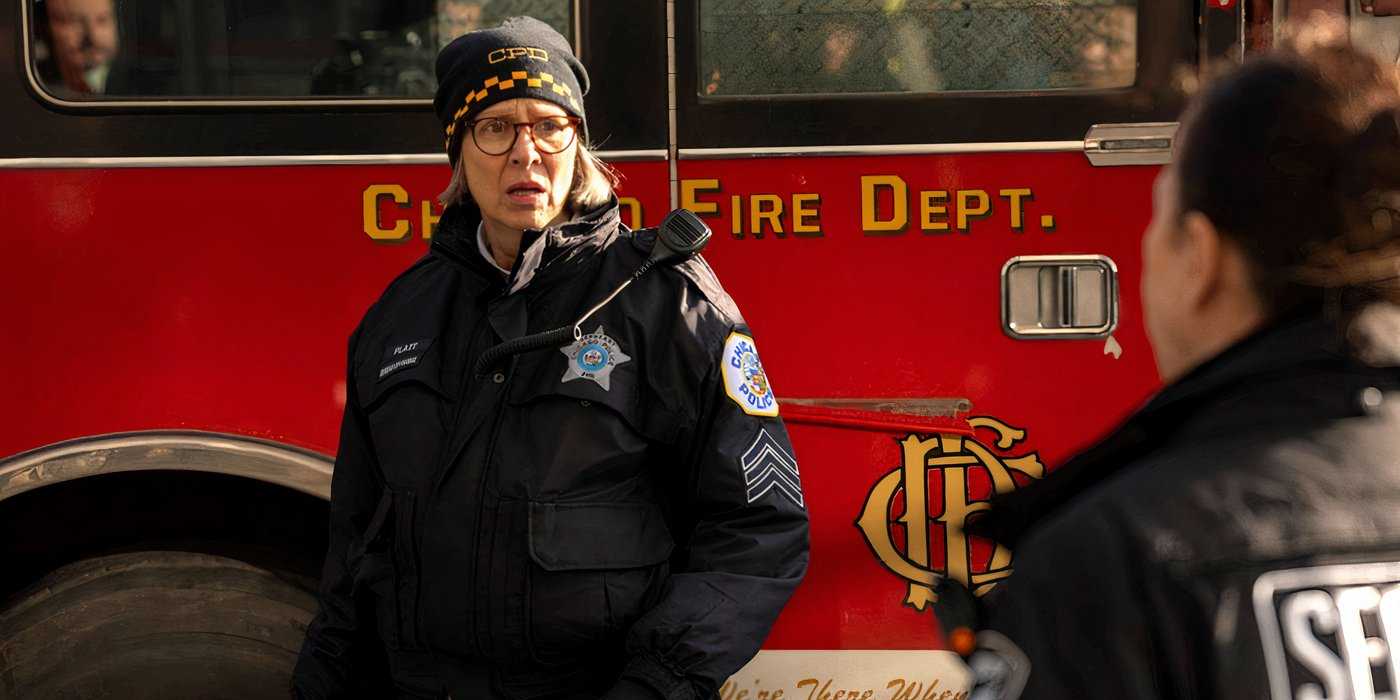 Trudy in One Chicago crossover standing by a fire truck