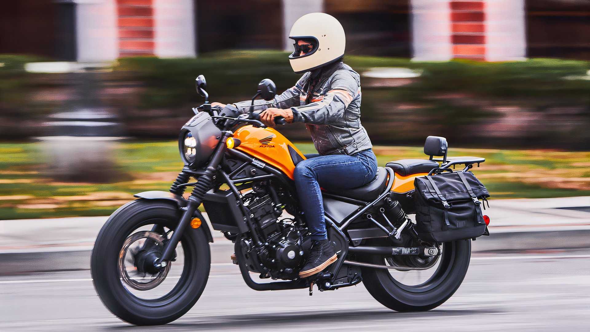 2025 Honda Rebel 300 accelerating front third quarter view