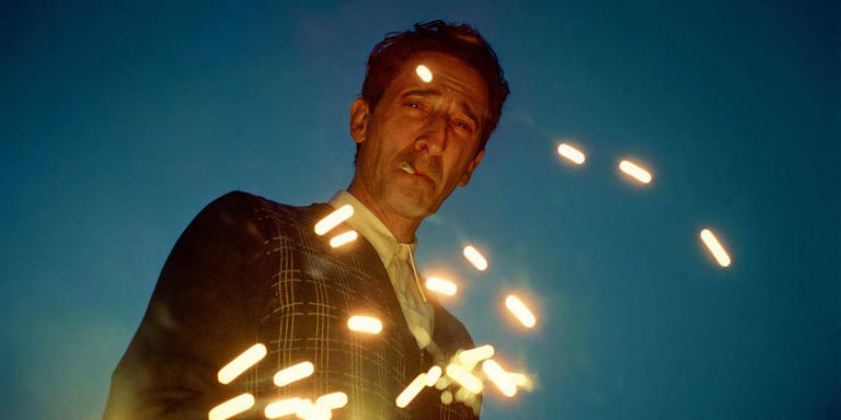 Adrien Brody smoking in The Brutalist