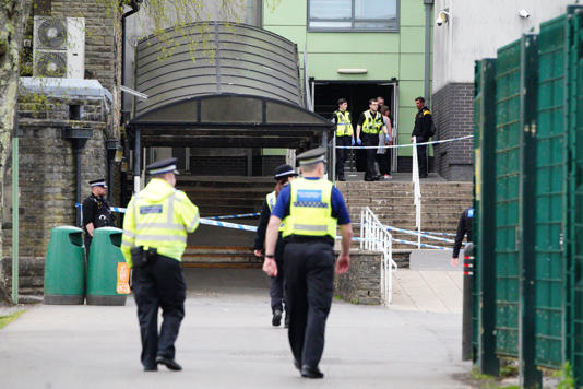 Police at Ysgol Dyffryn Aman, in Ammanford (Ben Birchall/PA)