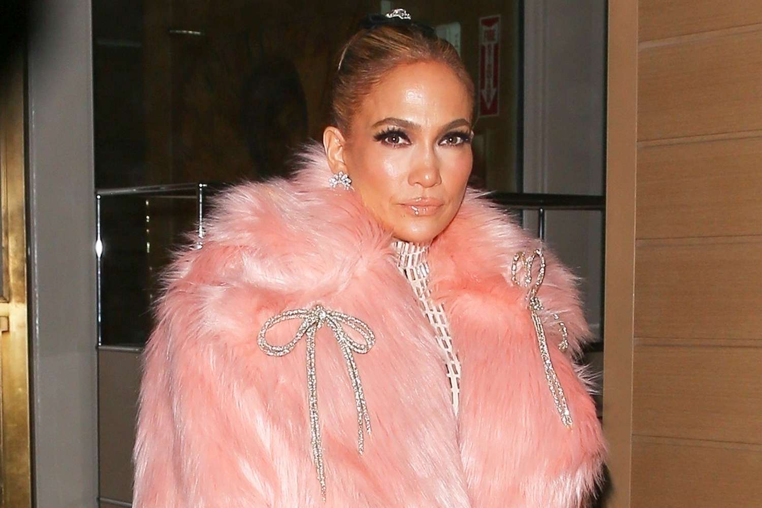 The Hollywood Jr/Gamr / BACKGRID Jennifer Lopez gets decked out in bows and bling after making a daring fashion statement at the 2025 Grammys