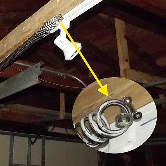 Garage-door-spring-on-screw-1200×1200