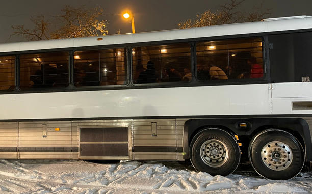 A bus carries those who had been arrested - DEA Rocky Mountain