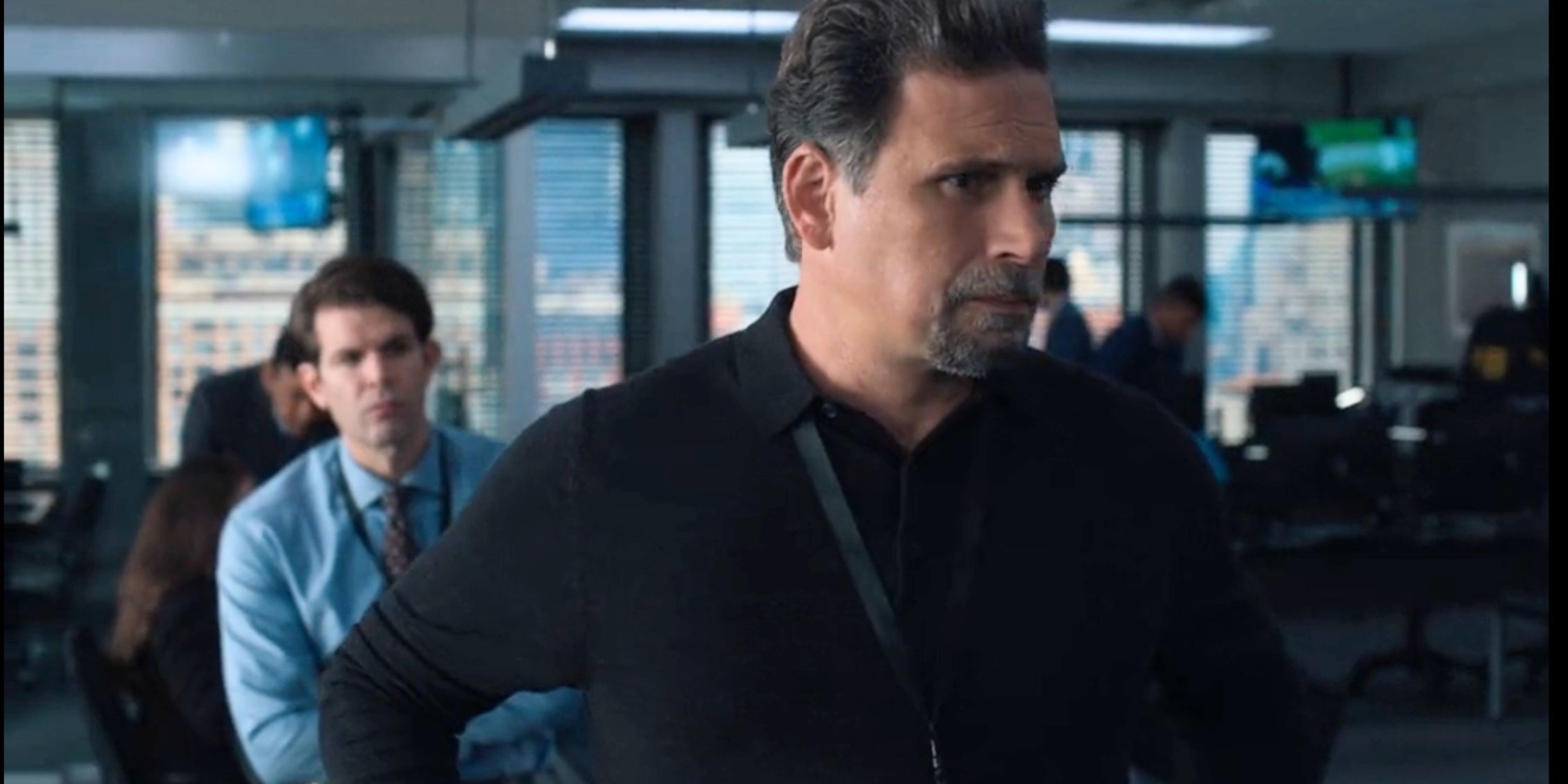 FBI Jubal standing and looking at something off-screen