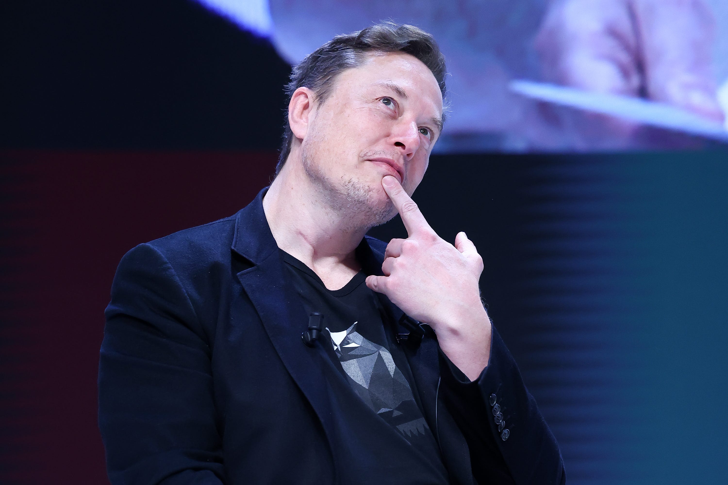 Elon Musk's shoes as Tesla CEO would be effectively impossible to fill, analysts told BI. Marc Piasecki/Getty Images