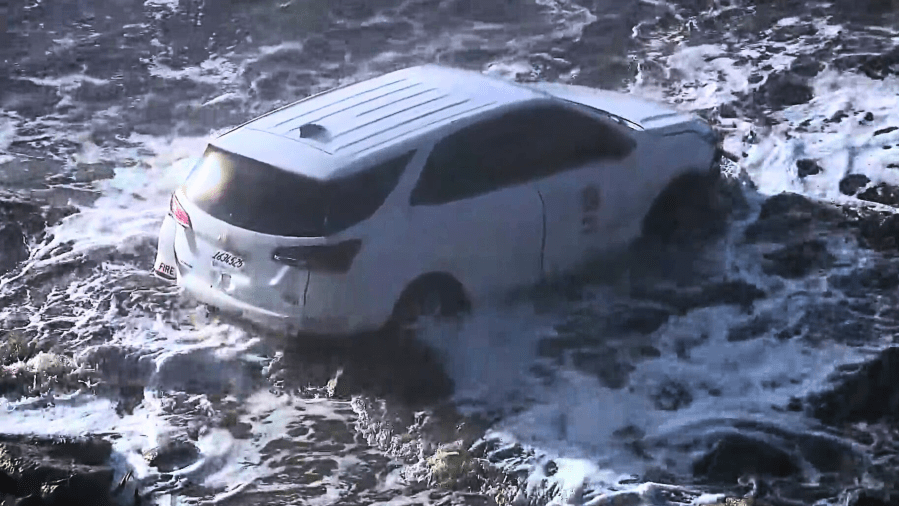 Firefighter likely used knife to escape SUV that plunged into Pacific Ocean