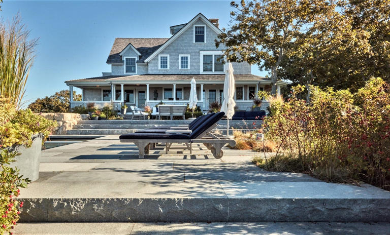 Real estate experts say high-end properties, such as this one in Woods Hole that sold last fall for $12 million, are not as affected by fluctuations in interest rates and even inventory.