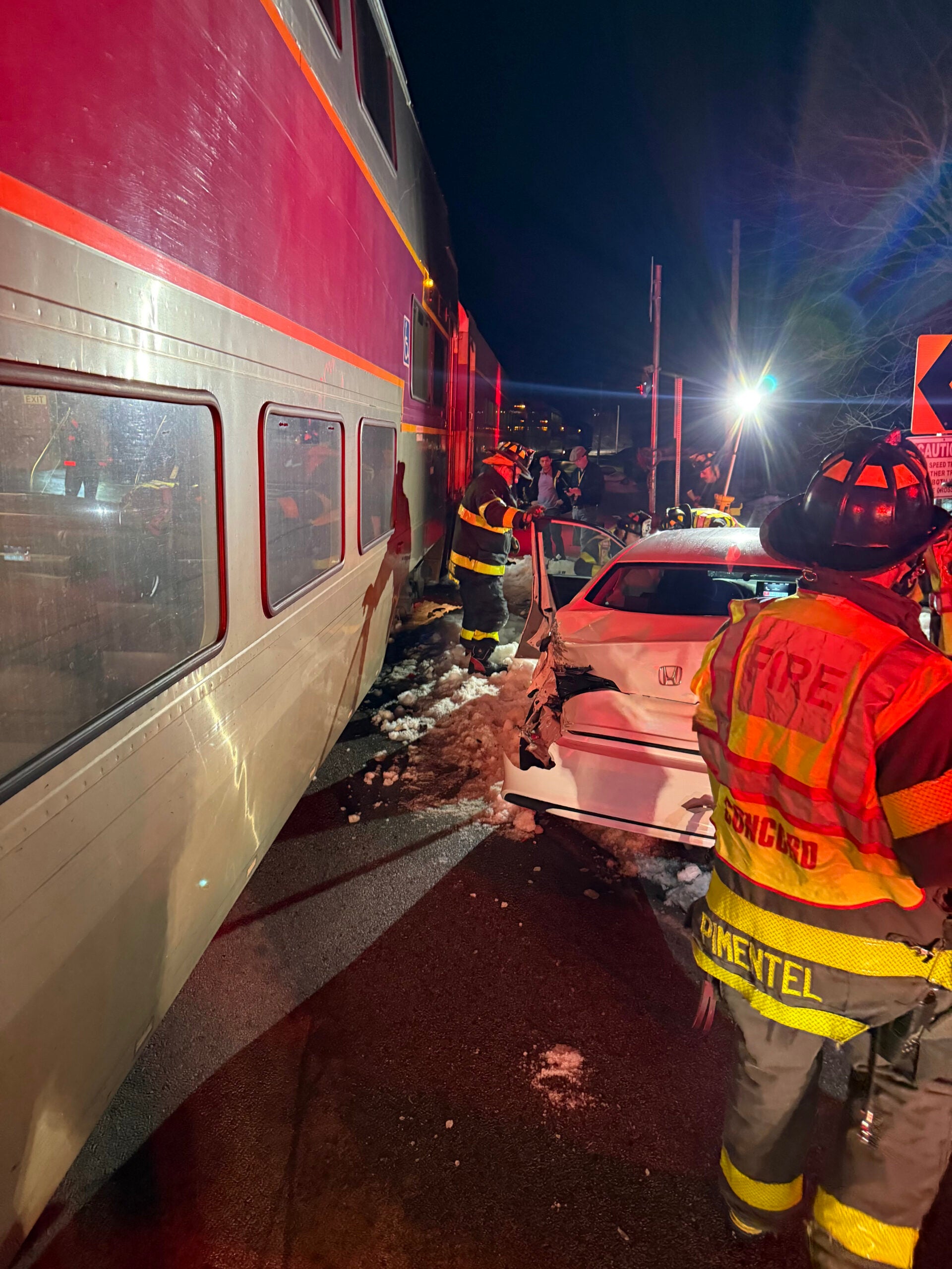 Commuter rail train strikes car in Concord, officials say