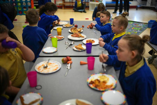 The Education Secretary said 750 schools will take part in a pilot of the free breakfast club scheme