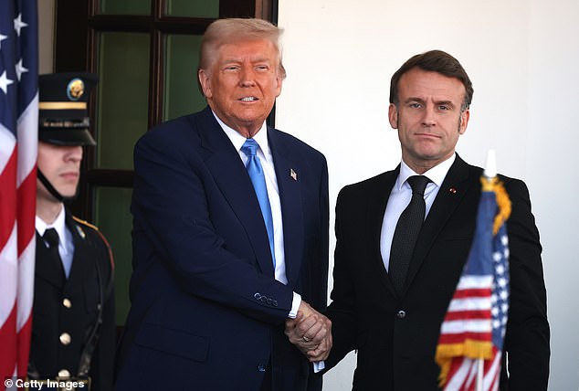 The two had an awkward handshake as Trump greeted Macron